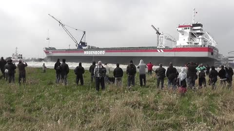 Ship Launching Makes Spectators Run For Dry Land