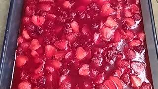 Cherry jello with fresh strawberries and raspberries