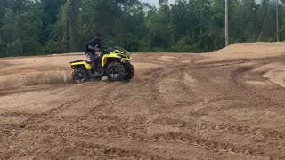 Quad Rider Bounces off After Rough Landing