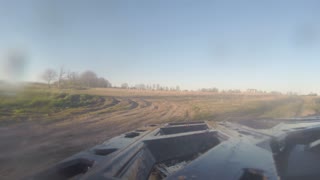 ATV riding through Mud on a Trail