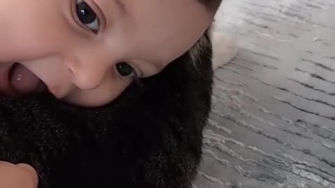 Kid playing with cat 😺