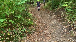 Kid on Bike Still Learning About Brakes