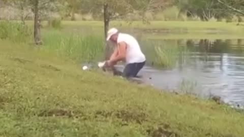Man Fights Alligator to Save Little Puppy