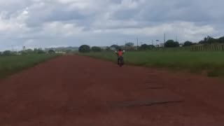 child on motorbike