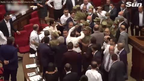 Shocking moment MPs brawl with the opposition party in Armenia