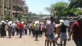 Members of concern traders committee march with Mkhonto Wesizwe Military Veterans Association