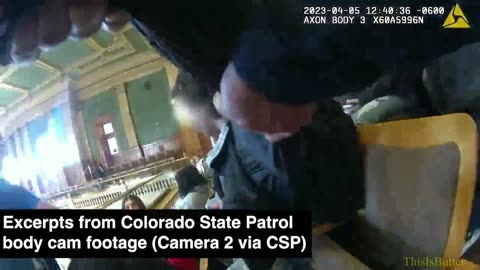 Colorado State troopers removing students from House Gallery during protest at the Capitol Building