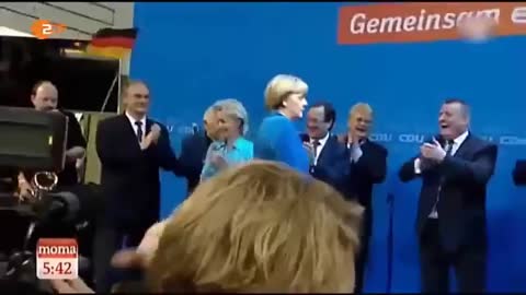 Merkel Throws Away German Flag in Disgust