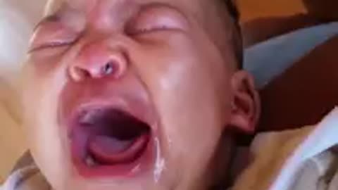 Mom's bad singing makes baby cry