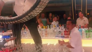 Professional cruise bartender shows off impeccable pouring skills