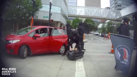 Antifa pulls riot shields out of car and tries to stop someone filming
