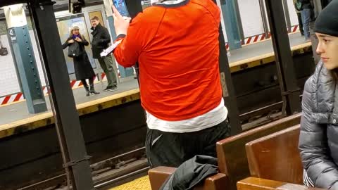 Pt. 1 new york subway rabbit man wearing the incredibles shirt records himself singing about rollercoasters