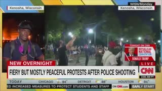 CNN ridiculed for "mostly peaceful" chyron displayed in front of burning building