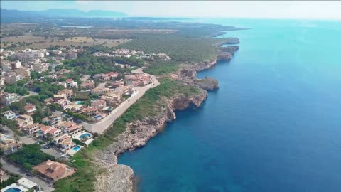 aerial landscape of the beautiful bay of cala mandia with a wonderful turquoise sea porto cristo