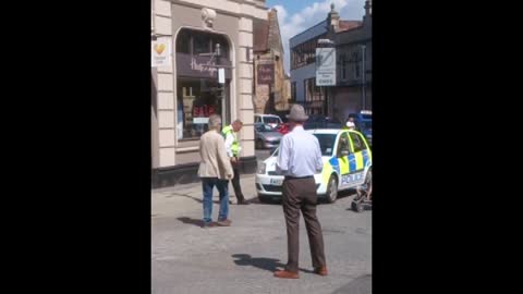 British policeman records violation of police car