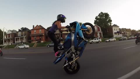 girl does amazing stunts with her bike