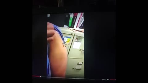 Nurse Gets Vaccinated - then A Magnet Can Hold on by her Jabbed Arm