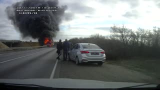 Semi Truck Bursts into Flames After Collision