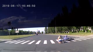 Cyclists Collide While Crossing a Russian Road