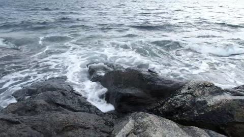 Free stock footage: Ocean waves splashing against the shore