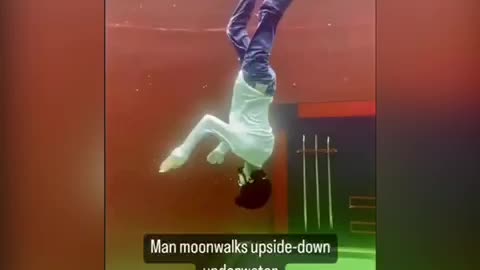 Man Moonwalks Upside Down Underwater