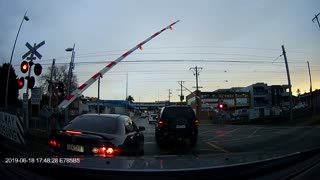 Car Gets Caught Under a Gate