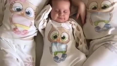 Twins sleeping Next To Their Baby Brother Like Little Gangesters
