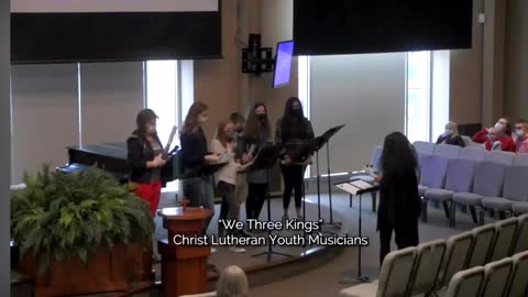 Lydia and Helena playing chimes at church.