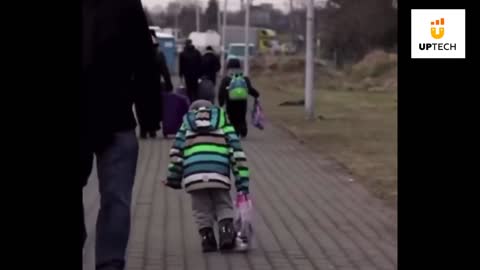 Little Ukrainian boy crying and walking to the border of Poland alone #UptechEntertainment #Uptech