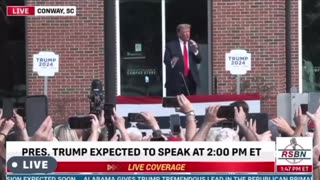 President Trump talks to the crowd outside