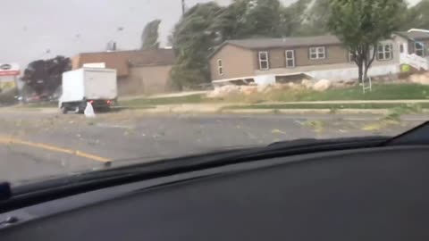 Utah Tornado Sends Debris Flying Across the Road