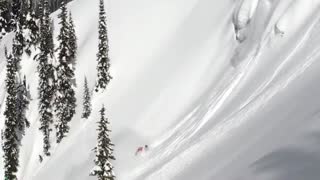 Both snowboard and ski cliff drops