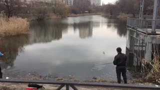 Two men have a great catch on the river