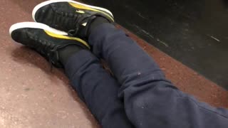 Man on floor blue pants train