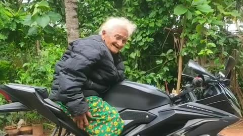 Funny grandma riding superbike
