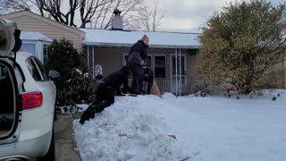 Snowboarding in the front yard