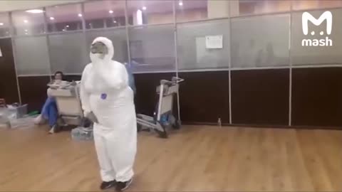 COVID Medic Dances To Ghostbusters Theme In Hazmat Gear