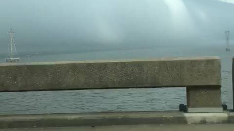 Driving Towards a Huge Rolling Storm
