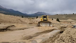 Gold mining and having KC clear my tailings from our new season.