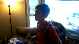 Kid Opens Up His Backpack To Reveal A Small Boy Inside It