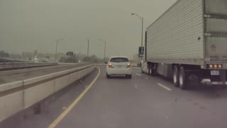 Speeding Car Smashes Mirror Weaving Through Traffic