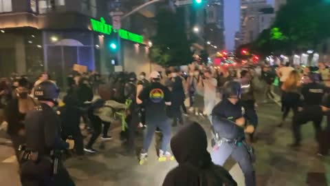 Antifa and Far-Left Protesters Surround and Attack LAPD Officers, Violence Ensues