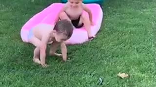 Kid Gets Swept by Buddy Going Down Slide