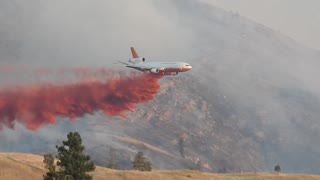 Spotter Plane Leads Firefighting Jet into Drop Zone