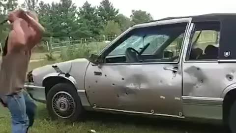 Baseball bat swings back at guys face