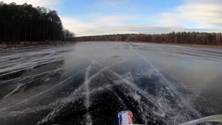 Motocross Rider Drives Across Beautiful Frozen Lake
