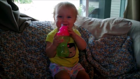 Toddler shares toasts with daddy