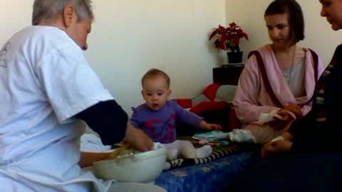 3 months old baby making cake