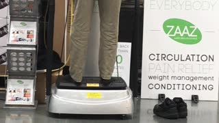 Man testing massager at Costco!