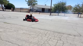 Crazy Go-Kart Driver Spinning Donuts